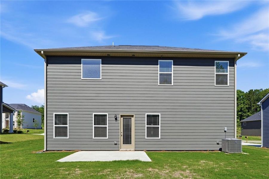 Exterior details and patio area of a home in River Walk Farm, Covington (Image 4).