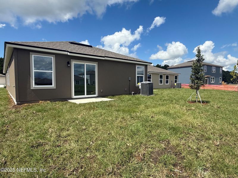 Exterior details and patio area of a home in The Arbors, Jacksonville (Image 4). Exterior details and patio area of a home in The Arbors, Jacksonville (Image 4).
