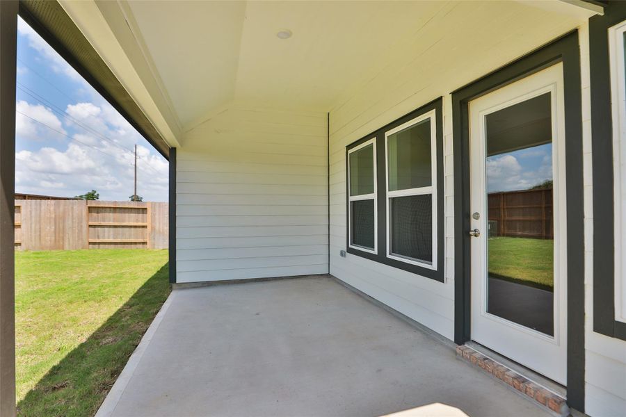 Front exterior of a new home in Oakwood Estates, Waller, TX, highlighting curb appeal (Image 24). Front exterior of a new home in Oakwood Estates, Waller, TX, highlighting curb appeal (Image 24).