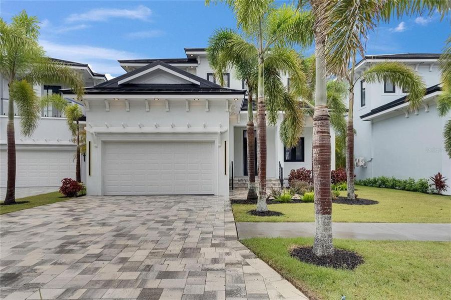Front exterior of a new home in , Apollo Beach, FL, highlighting curb appeal (Image 27).