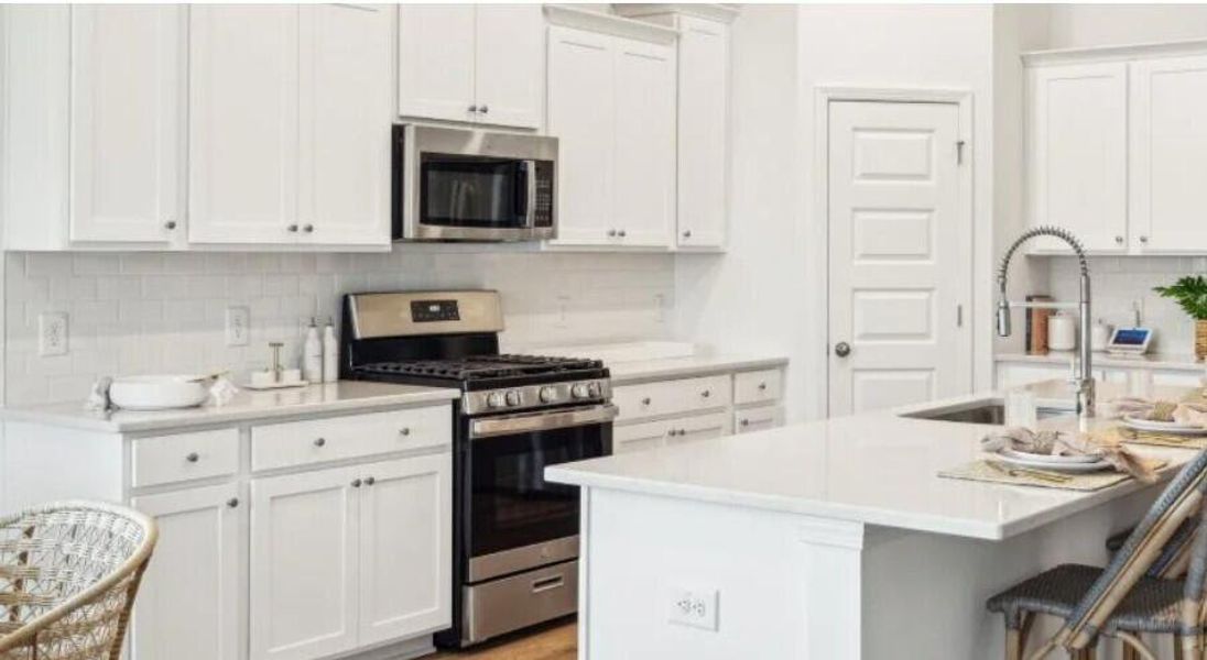 Furnished interior view inside a new home in Sweetgrass at Summers Corner, Summerville (Image 7).