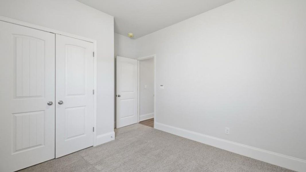 Spacious, unfurnished interior of a new home in Butner Estates, South Fulton (Image 32).