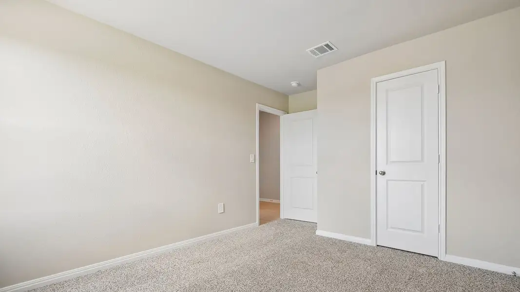 Spacious, unfurnished interior of a new home in Carillon, Manor (Image 30).