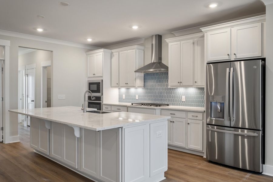 Furnished interior view inside a new home in The Bluffs at Pinefield Townhomes, Charleston (Image 6).