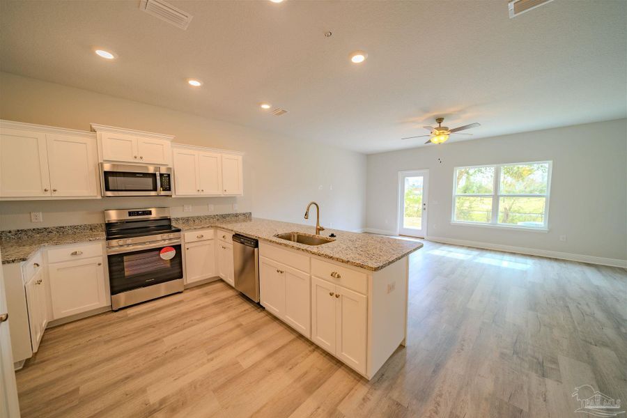 Furnished interior view inside a new home in Lexlee Estates, Pensacola (Image 4). Furnished interior view inside a new home in Lexlee Estates, Pensacola (Image 4).