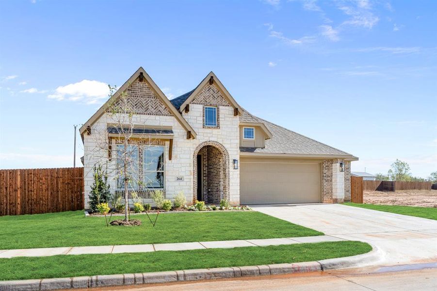 Front exterior of a new home in El Dorado, Granbury, TX, highlighting curb appeal (Image 19). Front exterior of a new home in El Dorado, Granbury, TX, highlighting curb appeal (Image 19).