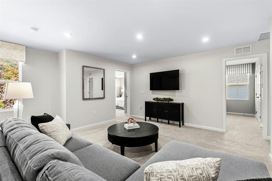 Representative furnished interior of a home built from the Woodford by Ryan Homes in Oakwood Trace, Fairburn (Image 22).