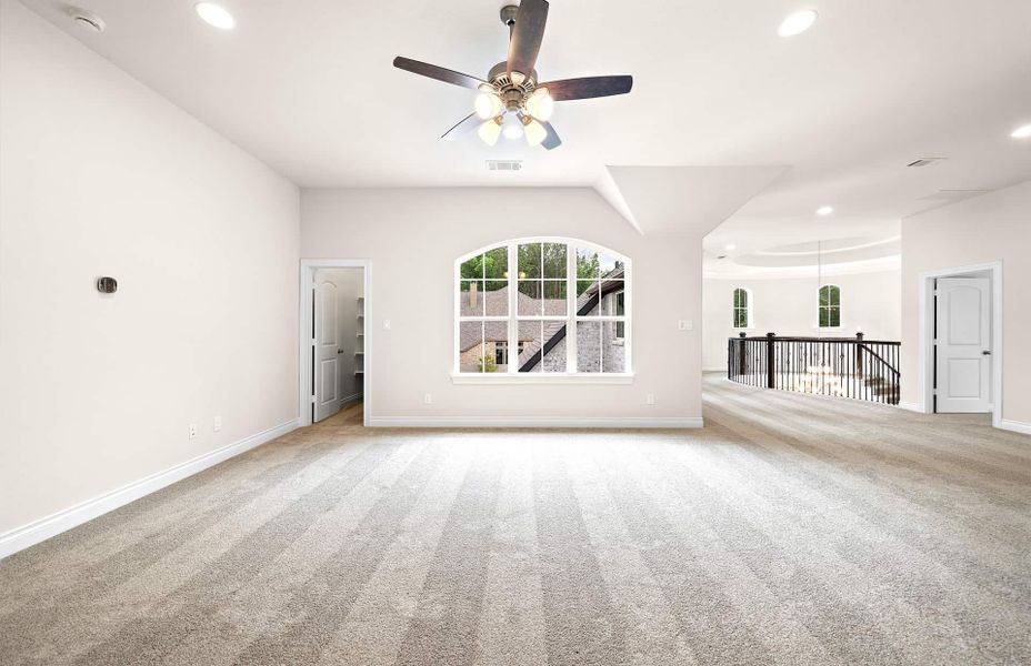 Representative unfurnished interior of a home built from the 4094 by Ravenna Homes in Artavia 70′, Conroe (Image 57).