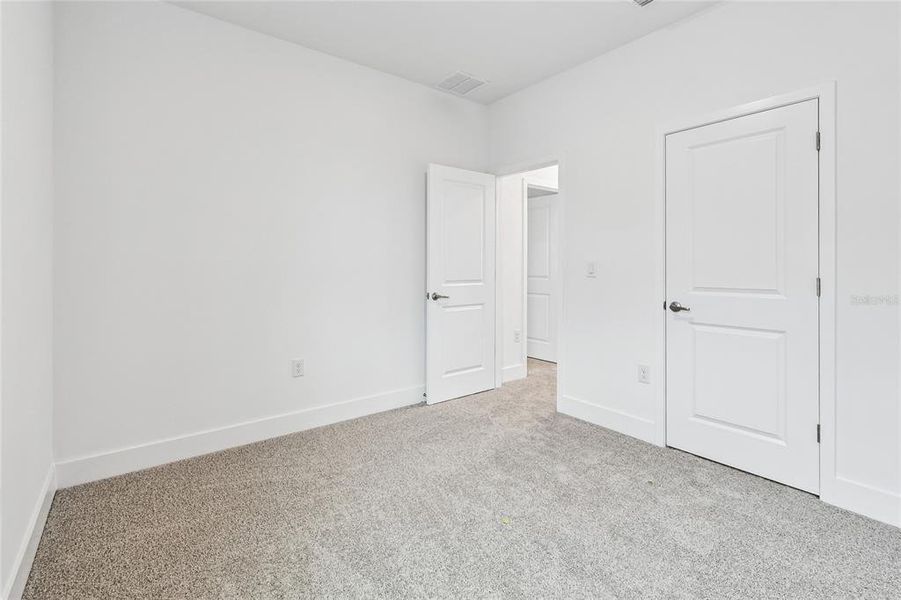 Spacious, unfurnished interior of a new home in Chapel Crossings, Wesley Chapel (Image 32).