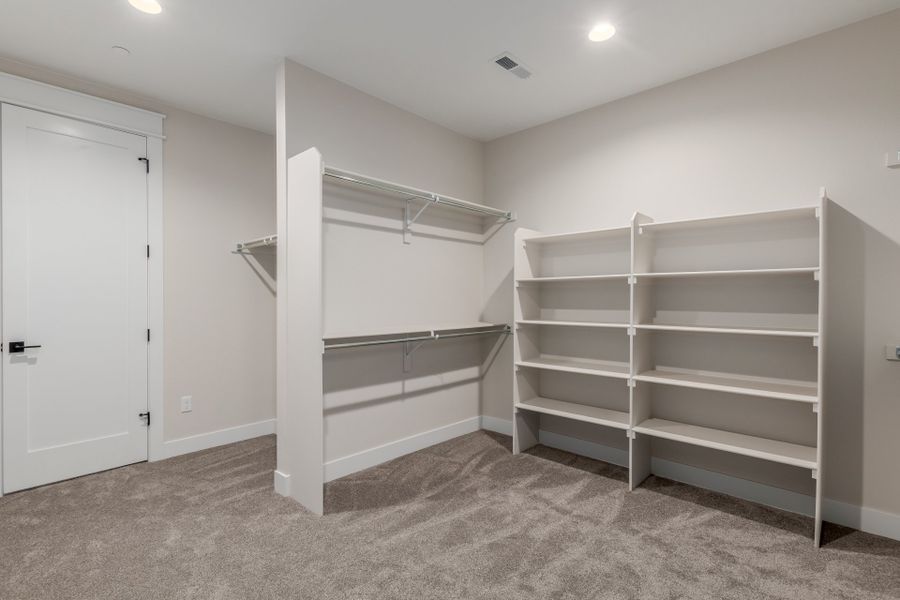 Representative furnished interior of a home built from the Luxe by Scott Felder Homes in Westerly, Erie (Image 11).