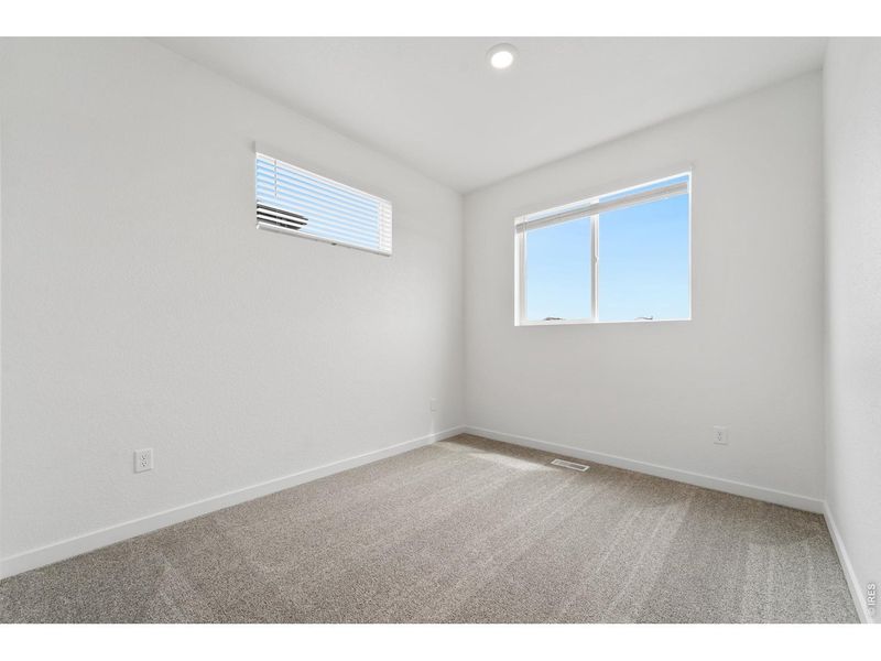Spacious, unfurnished interior of a new home in Liberty Draw, Evans (Image 22).