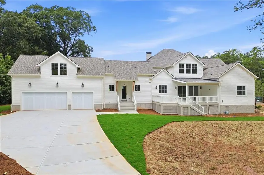 Front exterior of a new home in , Marietta, GA, highlighting curb appeal (Image 1). Front exterior of a new home in , Marietta, GA, highlighting curb appeal (Image 1).
