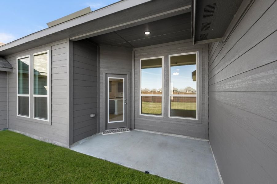 Front exterior of a new home in Still Water Lake, Godley, TX, highlighting curb appeal (Image 27). Front exterior of a new home in Still Water Lake, Godley, TX, highlighting curb appeal (Image 27).