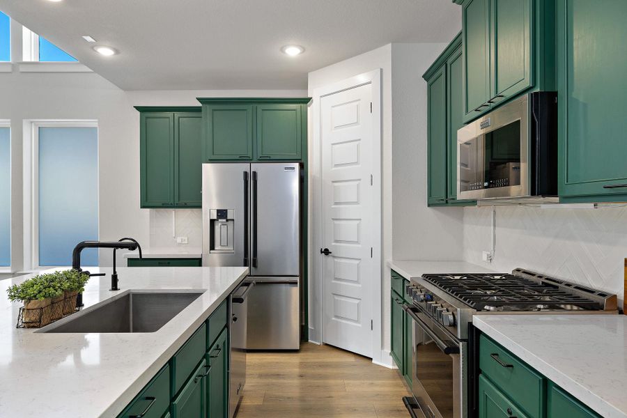 Furnished interior view inside a new home in Anthem 50', Kyle (Image 8).