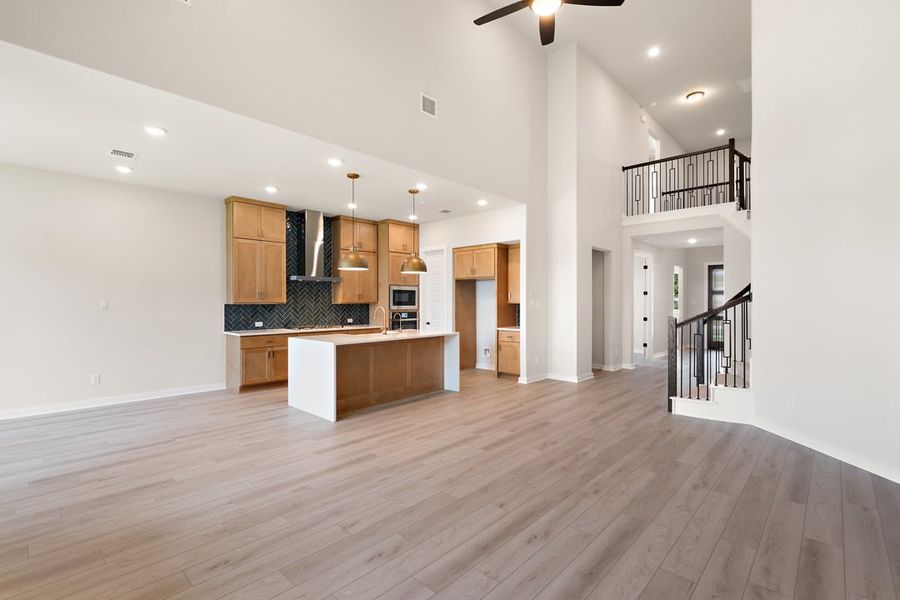 Furnished interior view inside a new home in Park Collection At Wolf Ranch, Georgetown (Image 19).