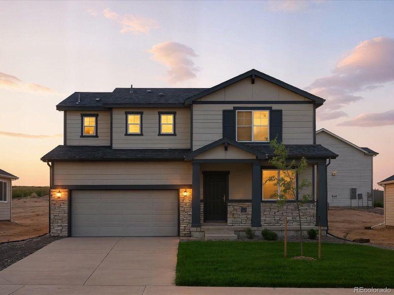 Front exterior of a new home in Poudre Heights: The Lakes Collection, Windsor, CO, highlighting curb appeal (Image 1).