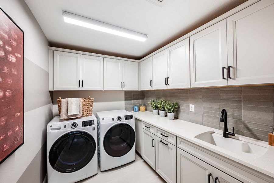 Representative furnished interior of a home built from the Pelican by Homes by WestBay in Crosswind Ranch, Parrish (Image 31).