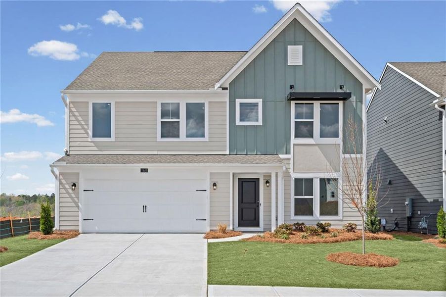 Front exterior of a new home in Twin Lakes, Hoschton, GA, highlighting curb appeal (Image 25).