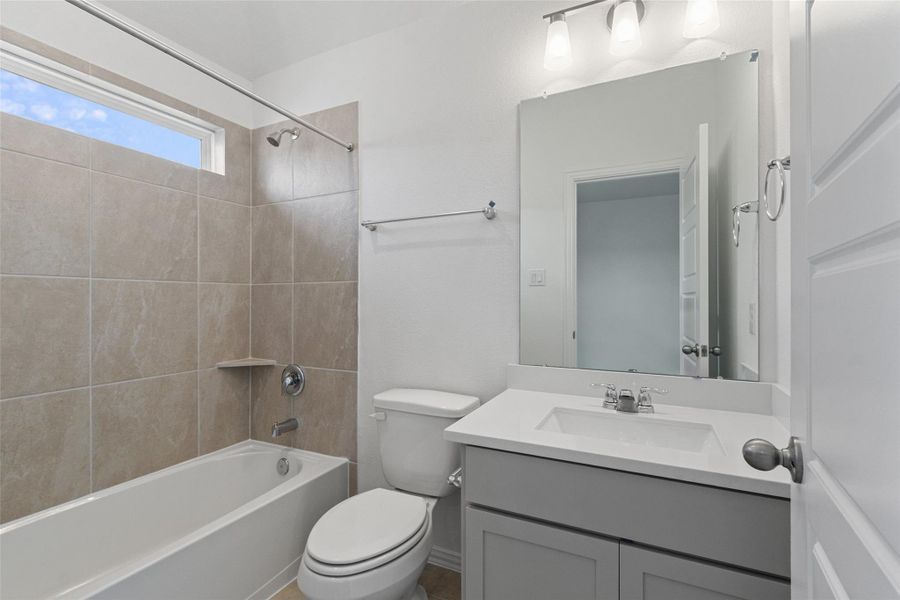 Furnished interior view inside a new home in Bridgeland Creekland Village, Cypress (Image 8).