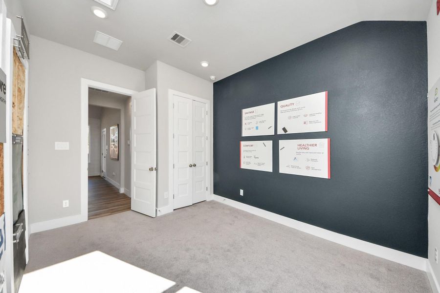 Spacious, unfurnished interior of a new home in Sunterra: Premier Collection, Katy (Image 19).