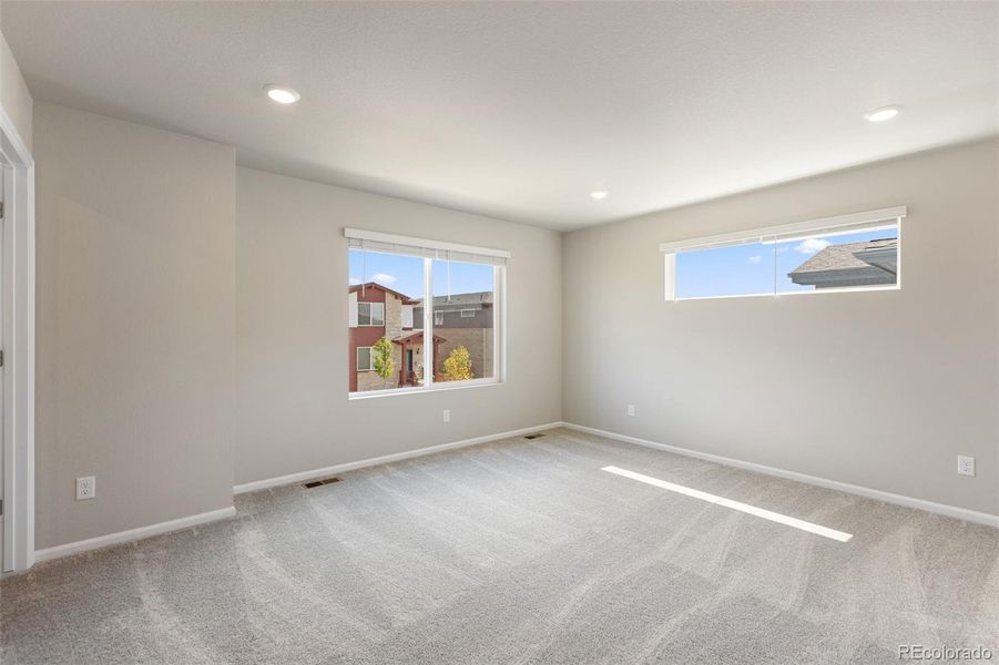 Spacious, unfurnished interior of a new home in Woodrose at Painted Prairie, Aurora (Image 26).