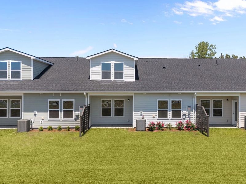 Exterior details and patio area of a home in Blue Heron Retreat, Little River (Image 4).