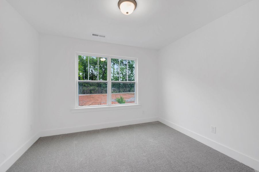 Spacious, unfurnished interior of a new home in Ashmore Townes, Garner (Image 27). Spacious, unfurnished interior of a new home in Ashmore Townes, Garner (Image 27).