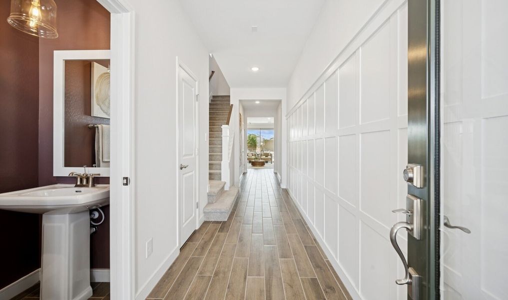Welcoming foyer with decorative feature wall