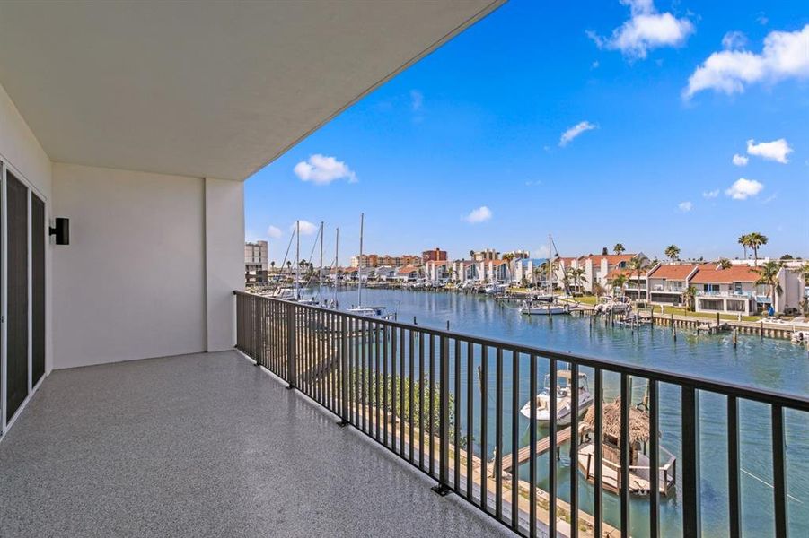 Exterior details and patio area of a home in Residences at Town Center, Madeira Beach (Image 29).