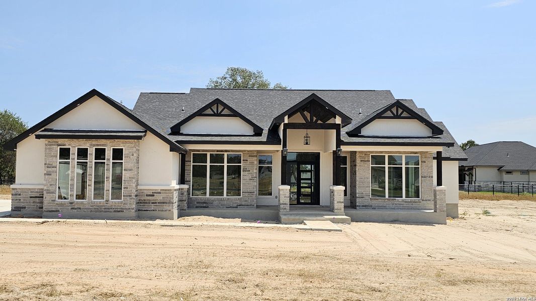 Front exterior of a new home in , Adkins, TX, highlighting curb appeal (Image 28).