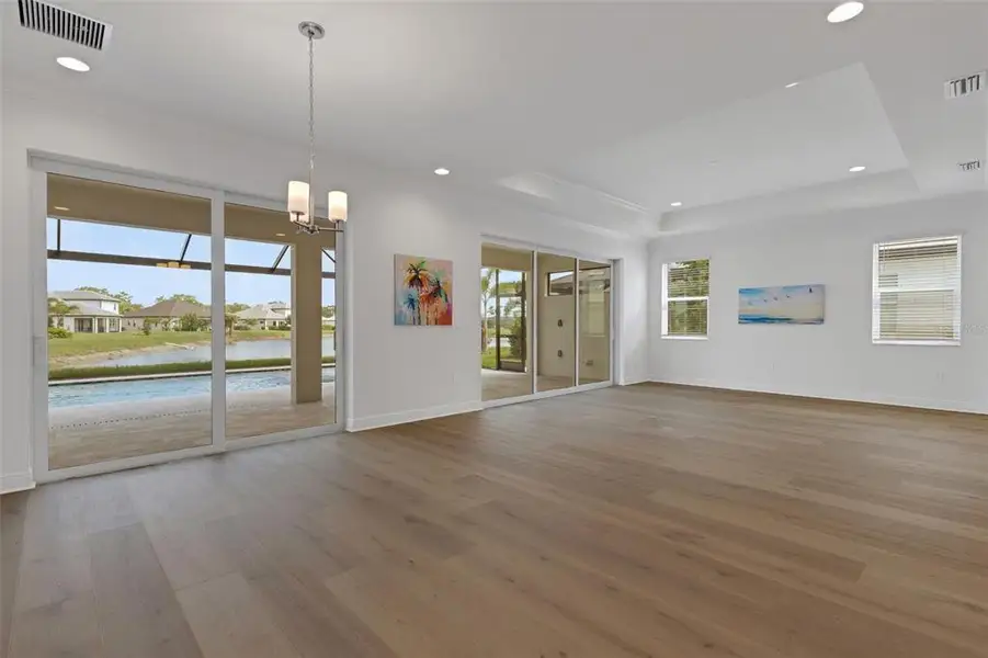 Spacious, unfurnished interior of a new home in Cassata Lakes, Nokomis (Image 54).