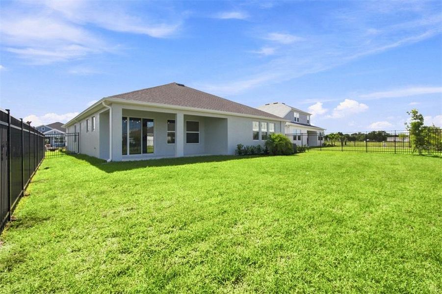 Exterior details and patio area of a home in Coasterra, Palmetto (Image 22).