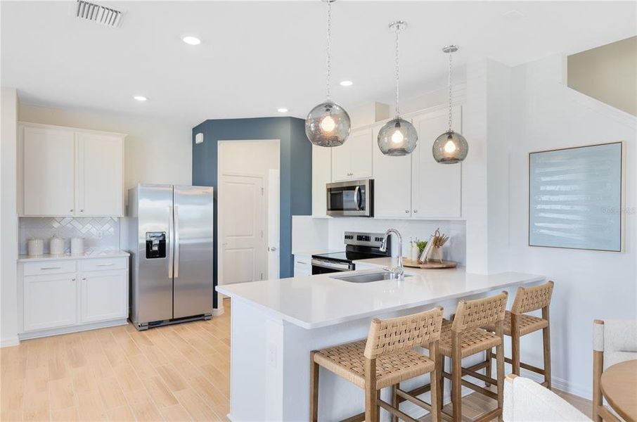 Furnished interior view inside a new home in , Davenport (Image 8).