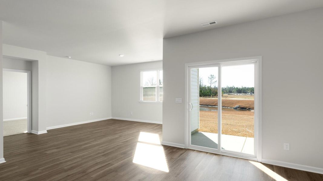 Spacious, unfurnished interior of a new home in The Grove at Blake Farm, Wilmington (Image 10).