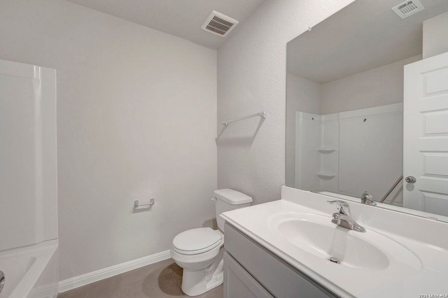 Furnished interior view inside a new home in Mesquite Ridge, San Antonio (Image 12).