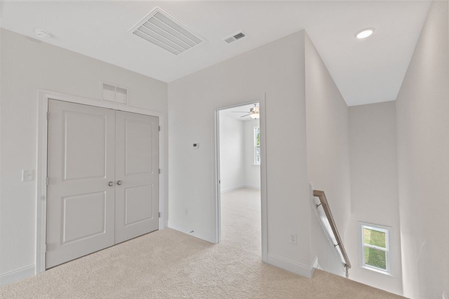 Representative unfurnished interior of a home built from the The Hemlock by RobuckHomes in Kennebec Crossing, Angier (Image 132).