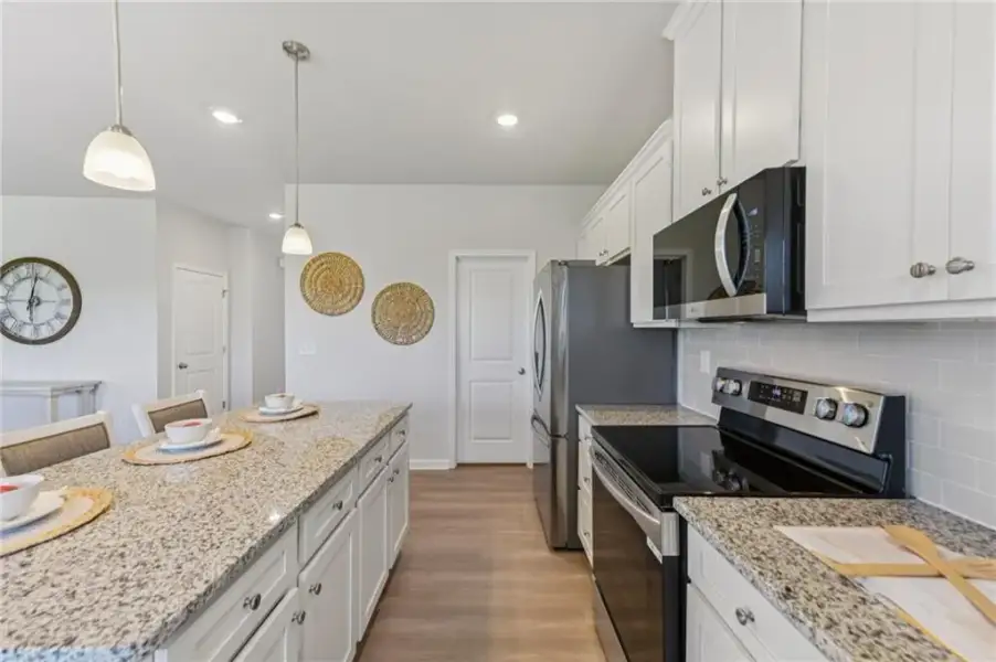 Furnished interior view inside a new home in The Hills at Cedar Creek, Winder (Image 27).