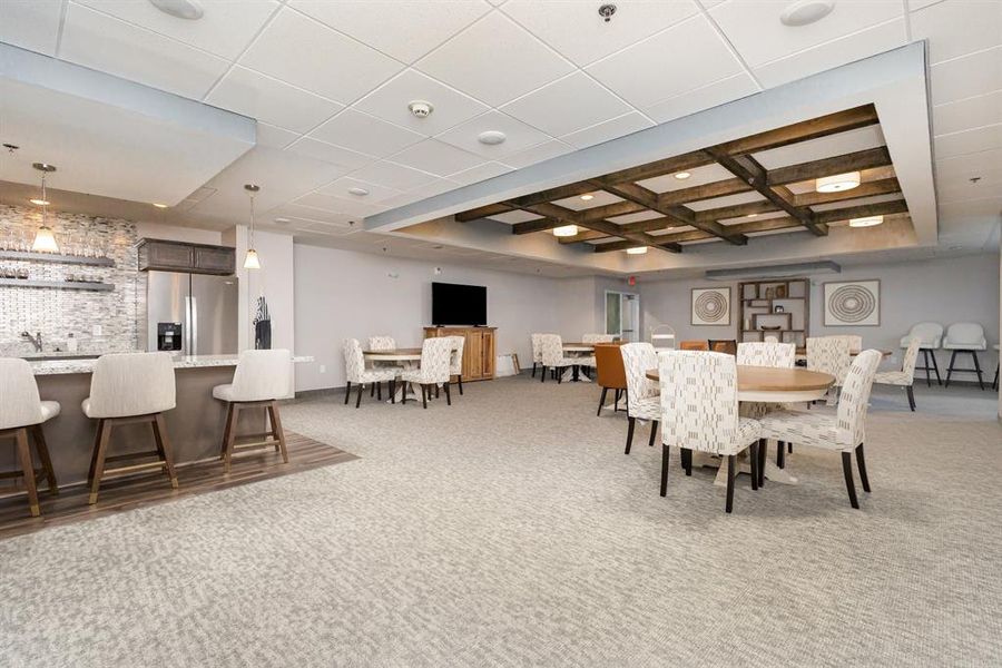 Second large gathering room for activities with an extended patio and kitchen Second large gathering room for activities with an extended patio and kitchen