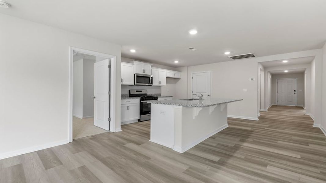 Furnished interior view inside a new home in Bentley Park, Greenwood (Image 5).