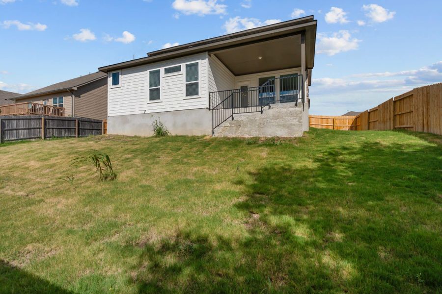 Exterior details and patio area of a home in Buffalo Crossing – New Phase Now Preselling, Cibolo (Image 4).