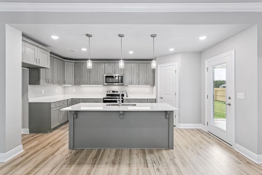 Representative furnished interior of a home built from the The Liberty by Herbst Homes in Prosperity Point, Milton (Image 54).