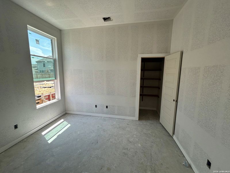 In-progress construction of a new home in Legacy at Lake Dunlap, New Braunfels, TX (Image 13).