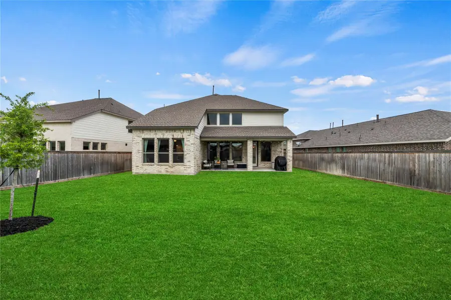 Bring the swing set, trampoline, and other yard toys and let the games begin. This oversized yard with a full sprinkler system offers endless possibilities for outdoor play and relaxation.