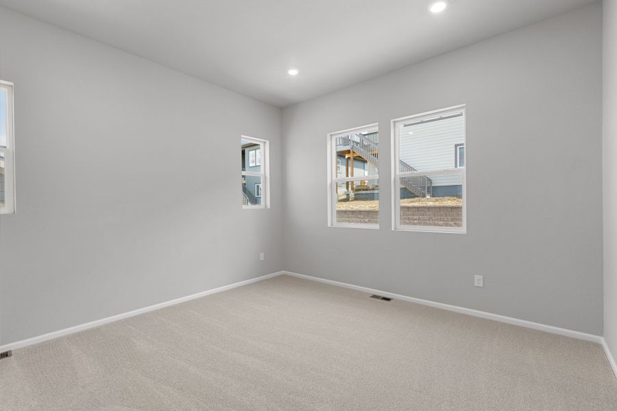 Spacious, unfurnished interior of a new home in The Manors Collection at Golden Overlook, Golden (Image 10).