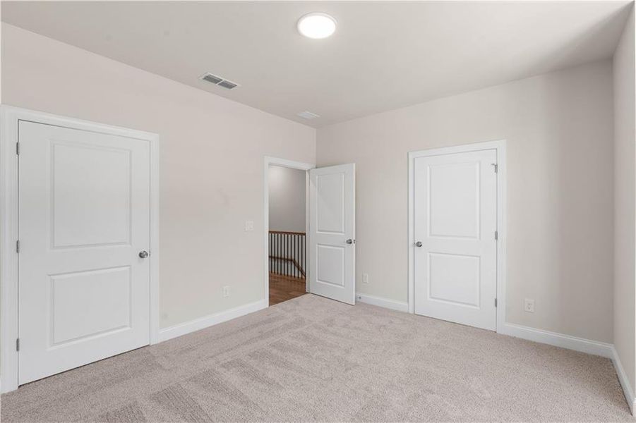 Spacious, unfurnished interior of a new home in Ward's Crossing Townhomes, Johns Creek (Image 25).