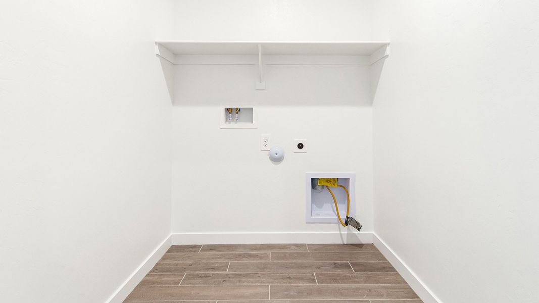 Representative unfurnished interior of a home built from the Baxter by D.R. Horton in The Oasis at Rocking K, Vail (Image 36).