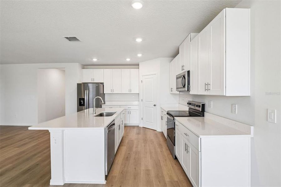 Furnished interior view inside a new home in Two Rivers - Classic Series, Zephyrhills (Image 5).