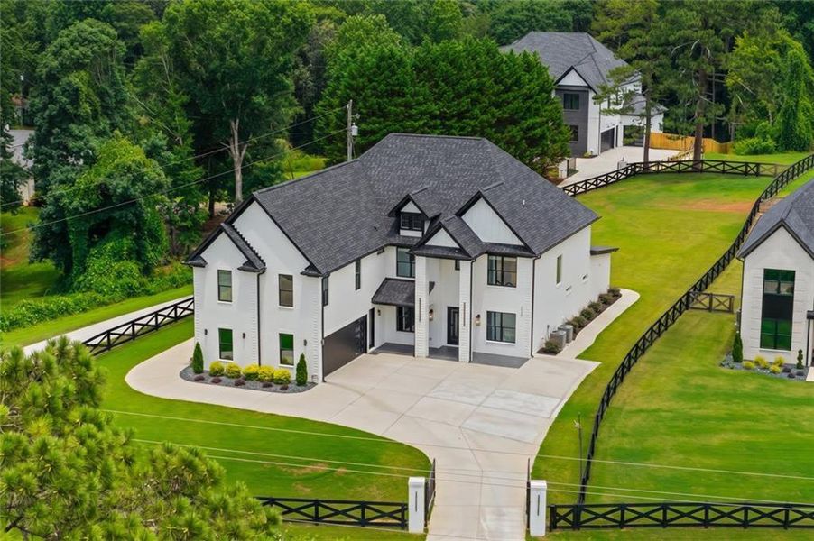 Front exterior of a new home in , Braselton, GA, highlighting curb appeal (Image 30).