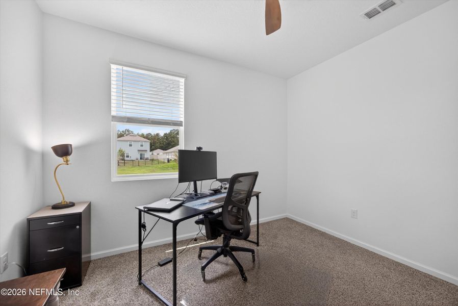 Furnished interior view inside a new home in Entrada, St. Augustine (Image 39).