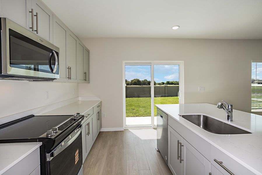 Furnished interior view inside a new home in Scenic Terrace, Haines City (Image 5).